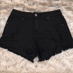Fringed /ripped black shorts